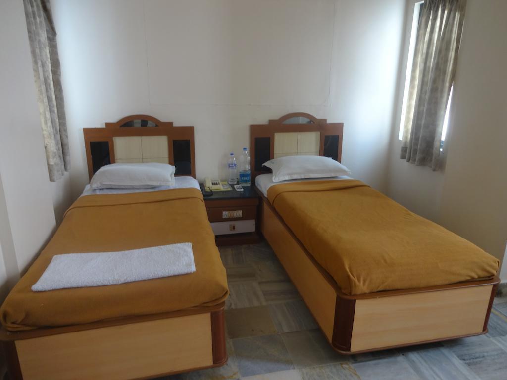 Hotel Vinayak Κοϊμπατόρε Δωμάτιο φωτογραφία